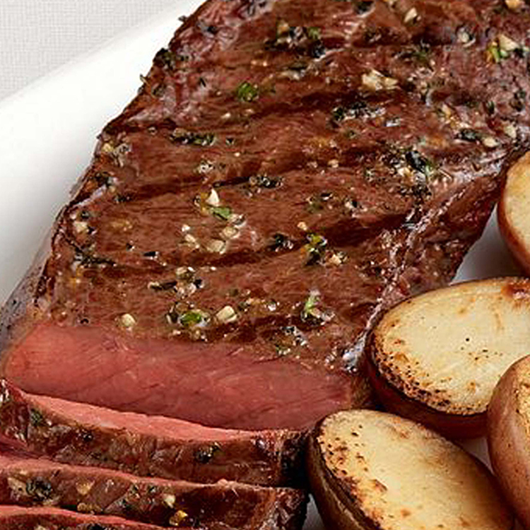 Picture of Tender Pepper Rubbed Strip Steaks with Grilled Vegetable Trio