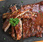Picture of Smoke Pit Baby Back Ribs